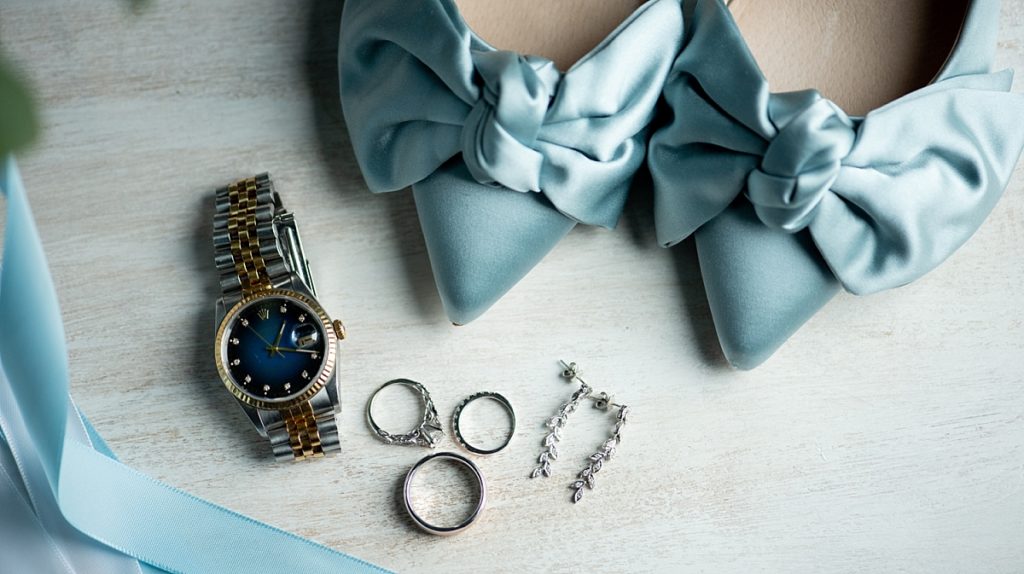 Tiffany blue wedding shoes with wedding rings and accessories
