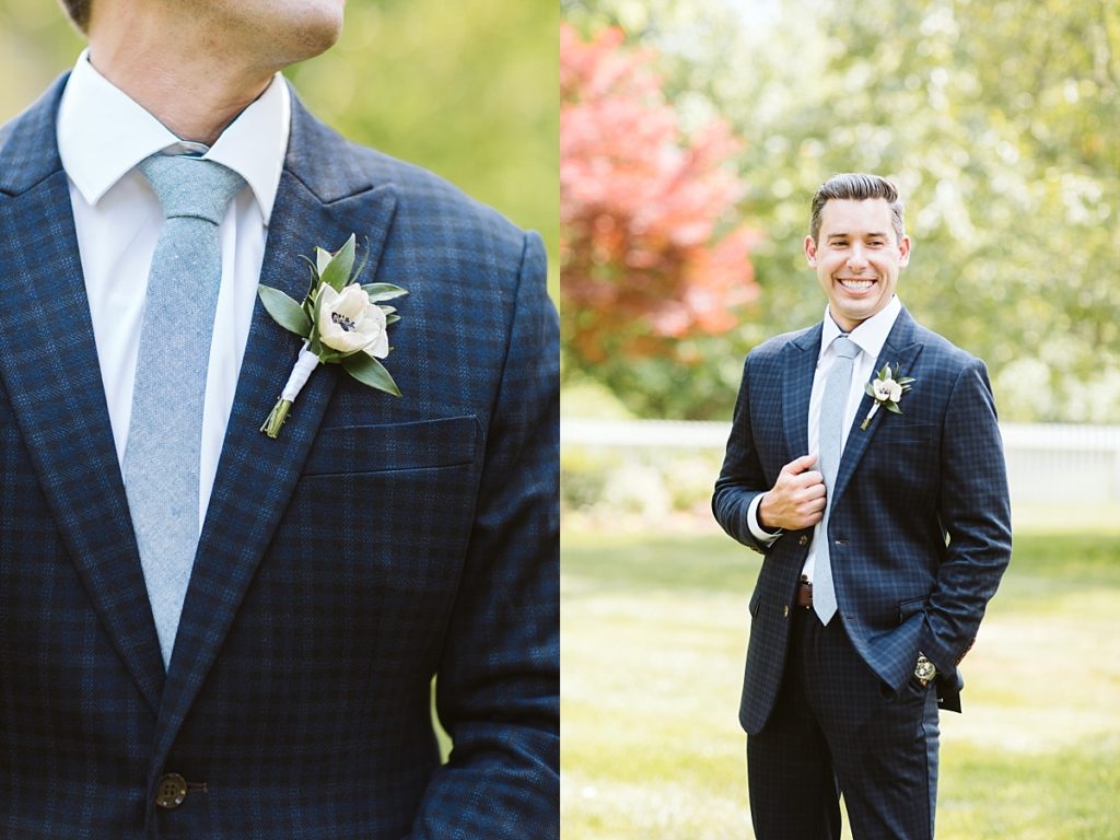 Groom wearing a fitted blue plaid sports blazer suit
