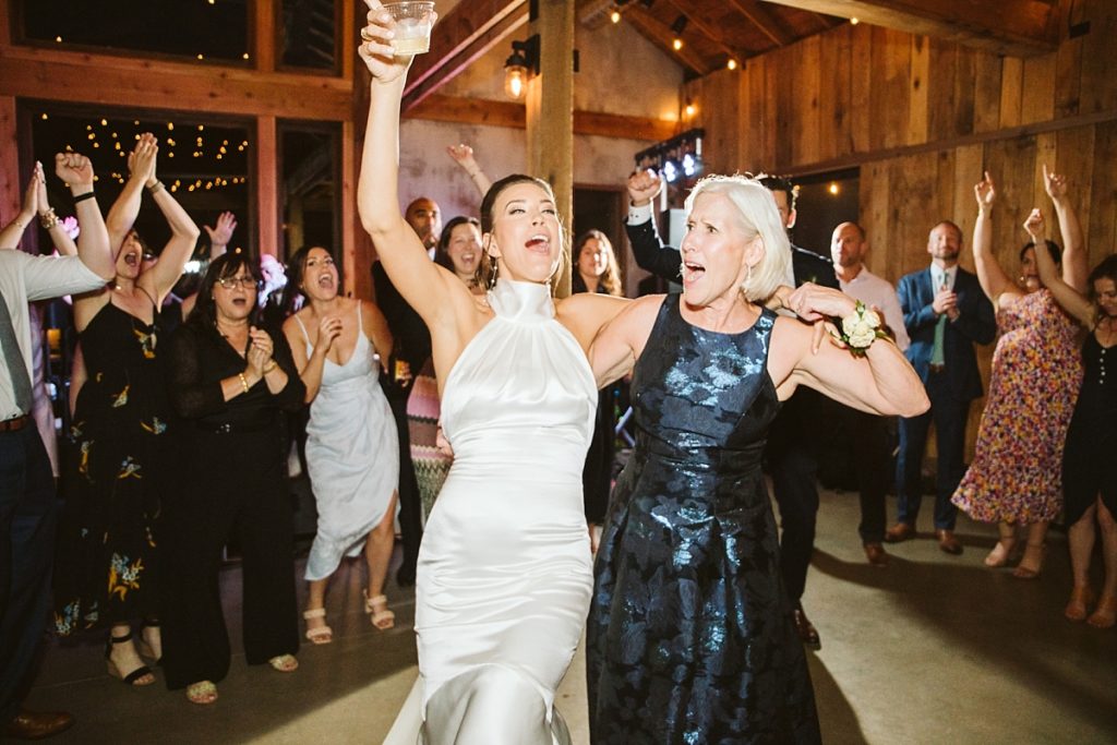 Bride dancing with her mother in law
