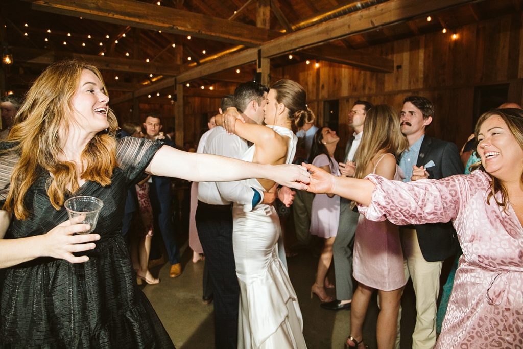Wedding guests dancing together