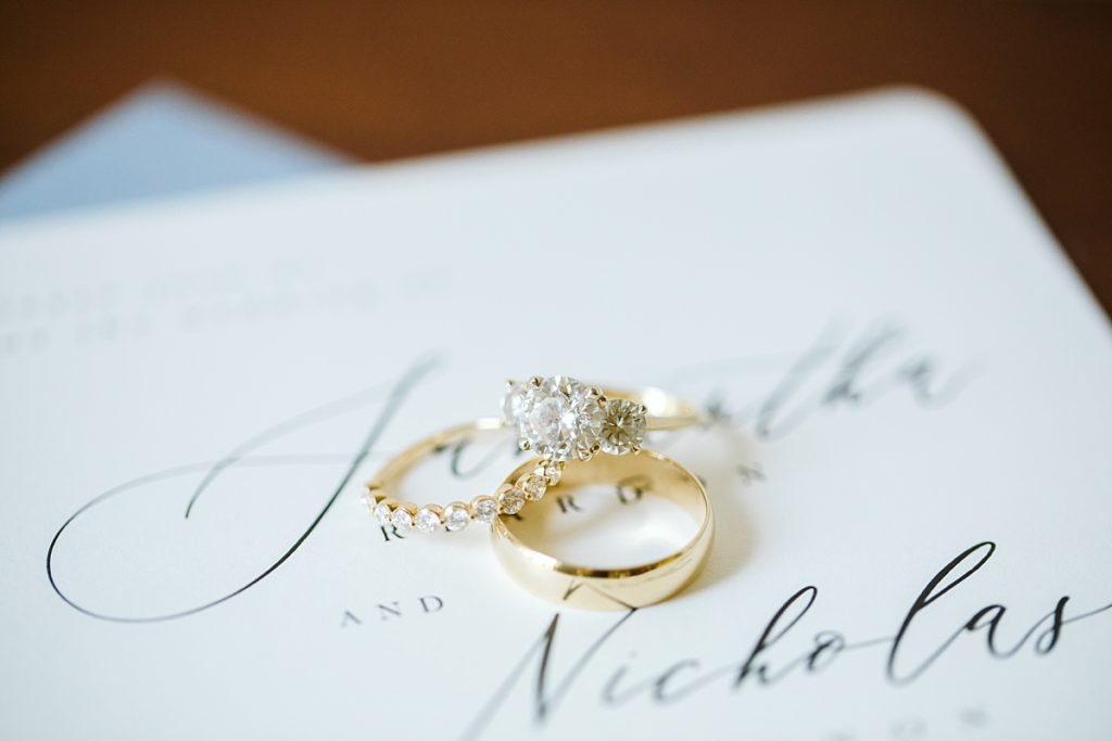 Gold wedding rings, engagement ring and diamond wedding band