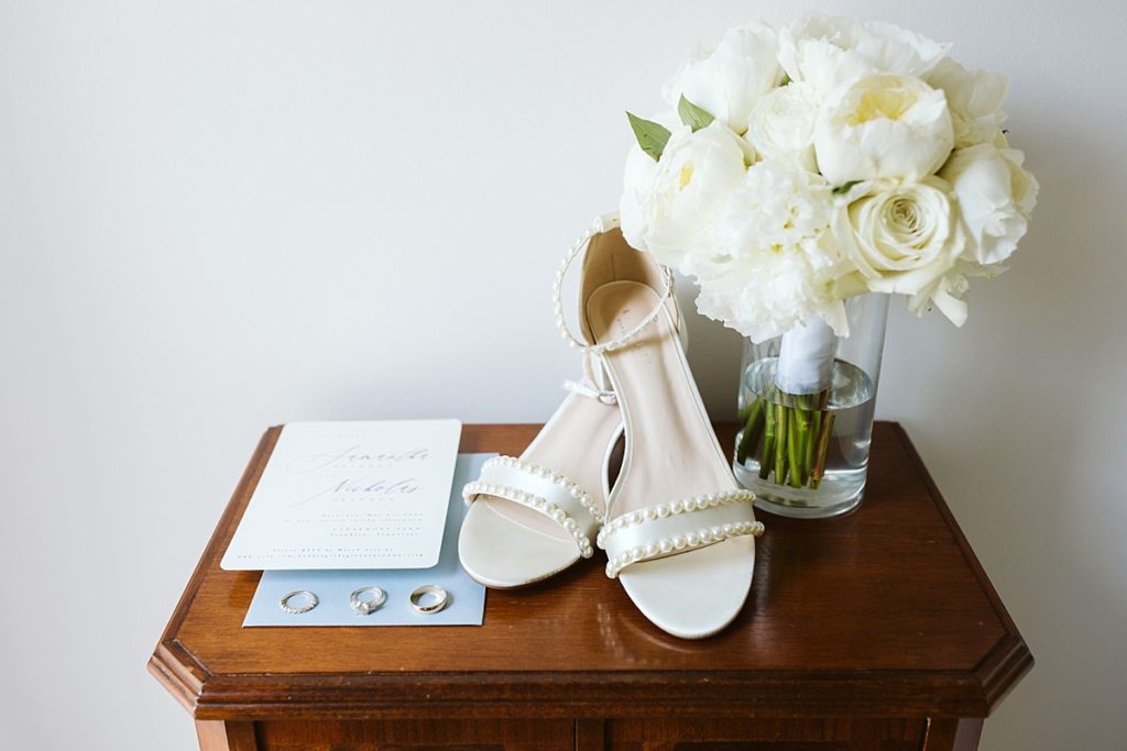 Classic White bridal bouquet and pearl shoes
